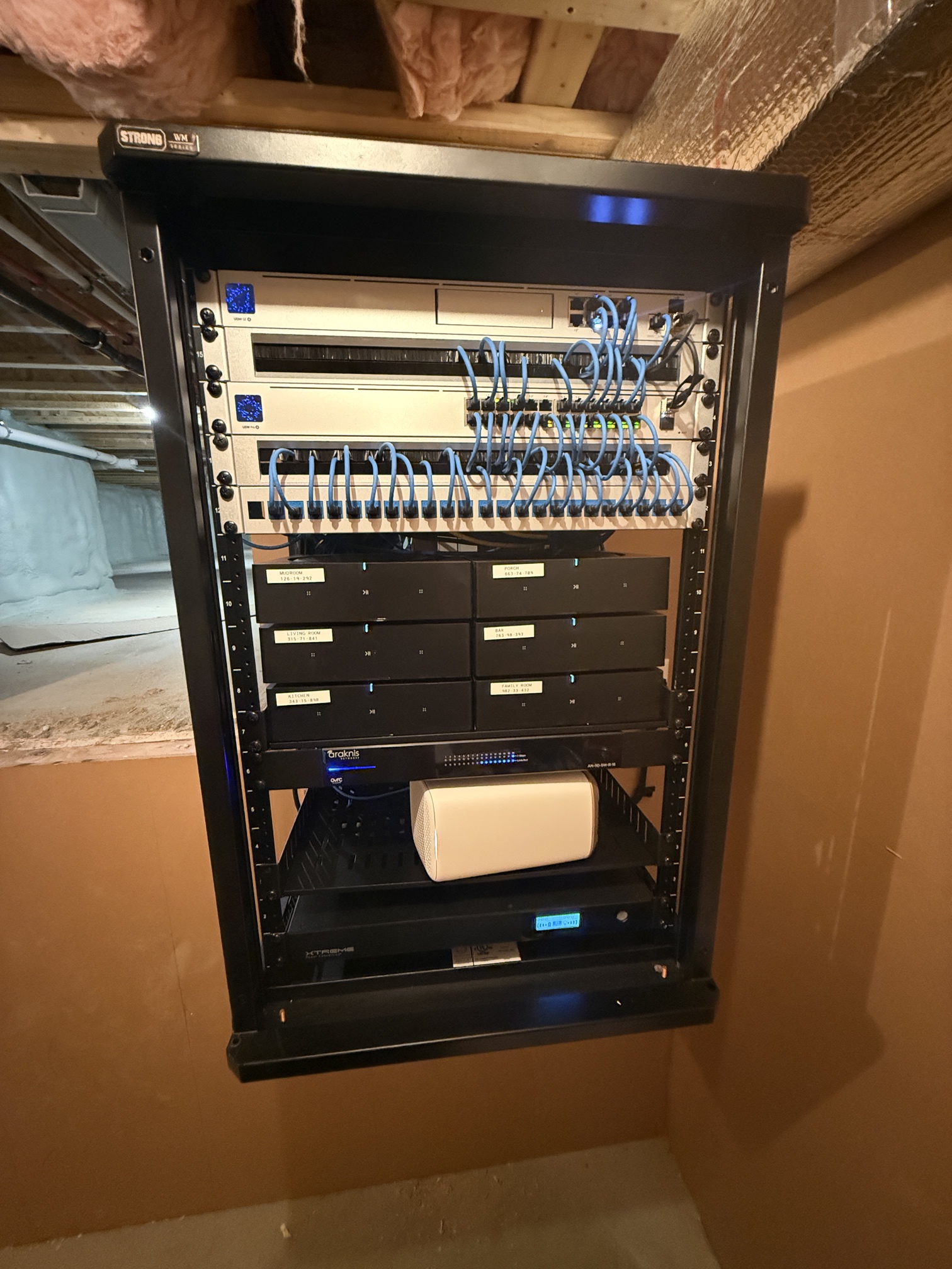Clean UniFi network rack installed in a Martha's Vineyard home by MVIS