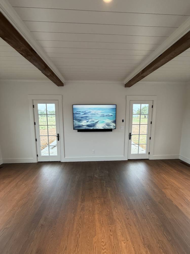 Mounted Samsung TV and soundbar