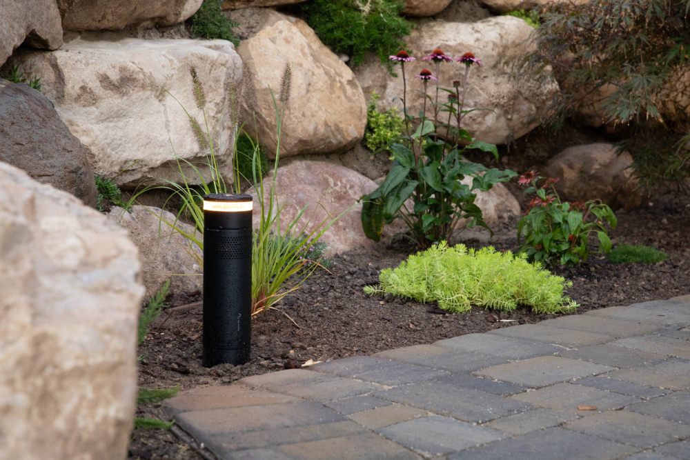 Modern home at dusk with outdoor architectural lighting