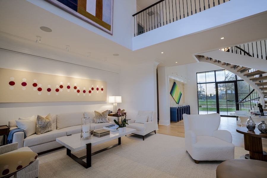 Modern home at dusk with outdoor entertainment audio