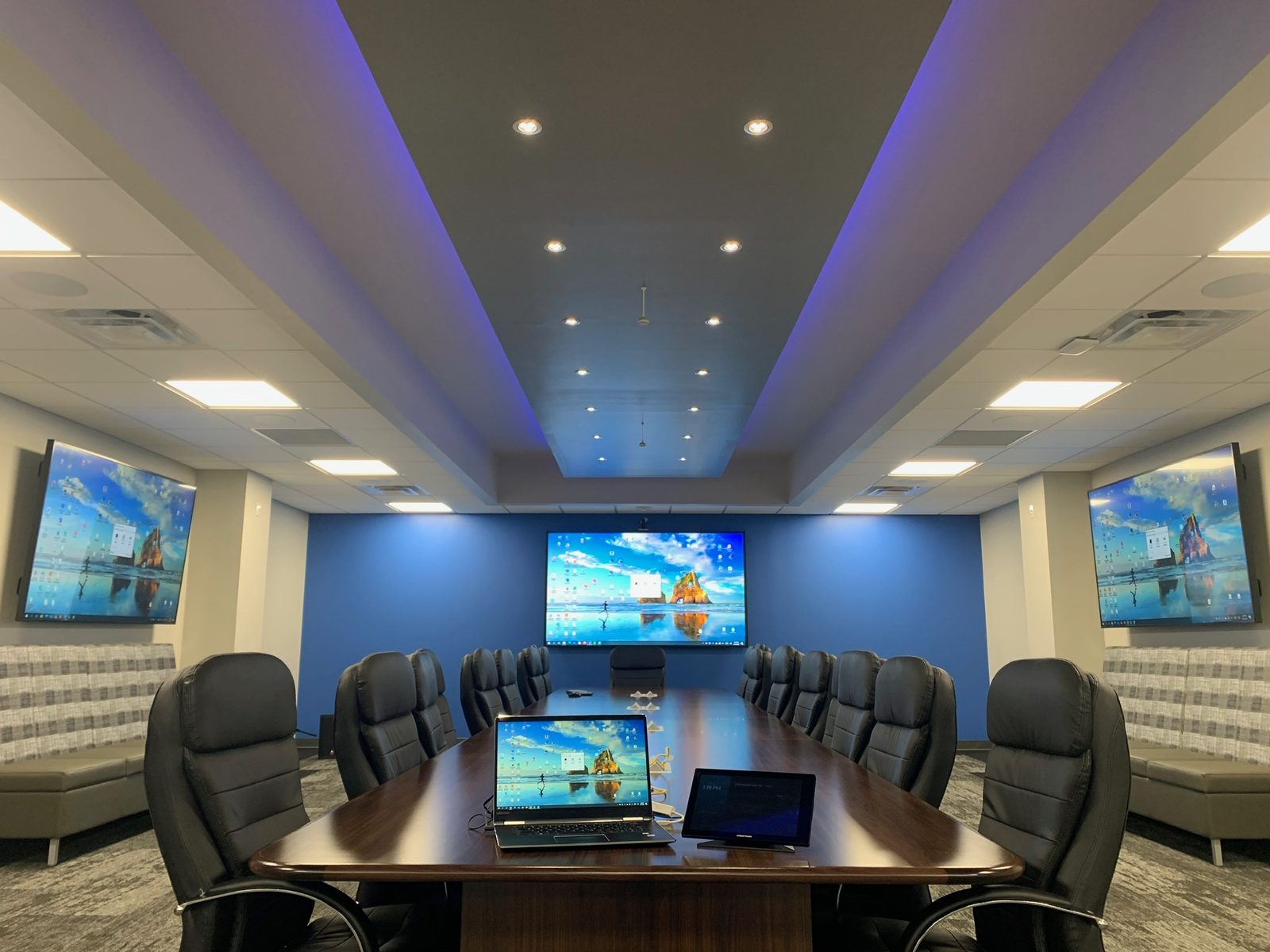 Corporate boardroom with dual displays