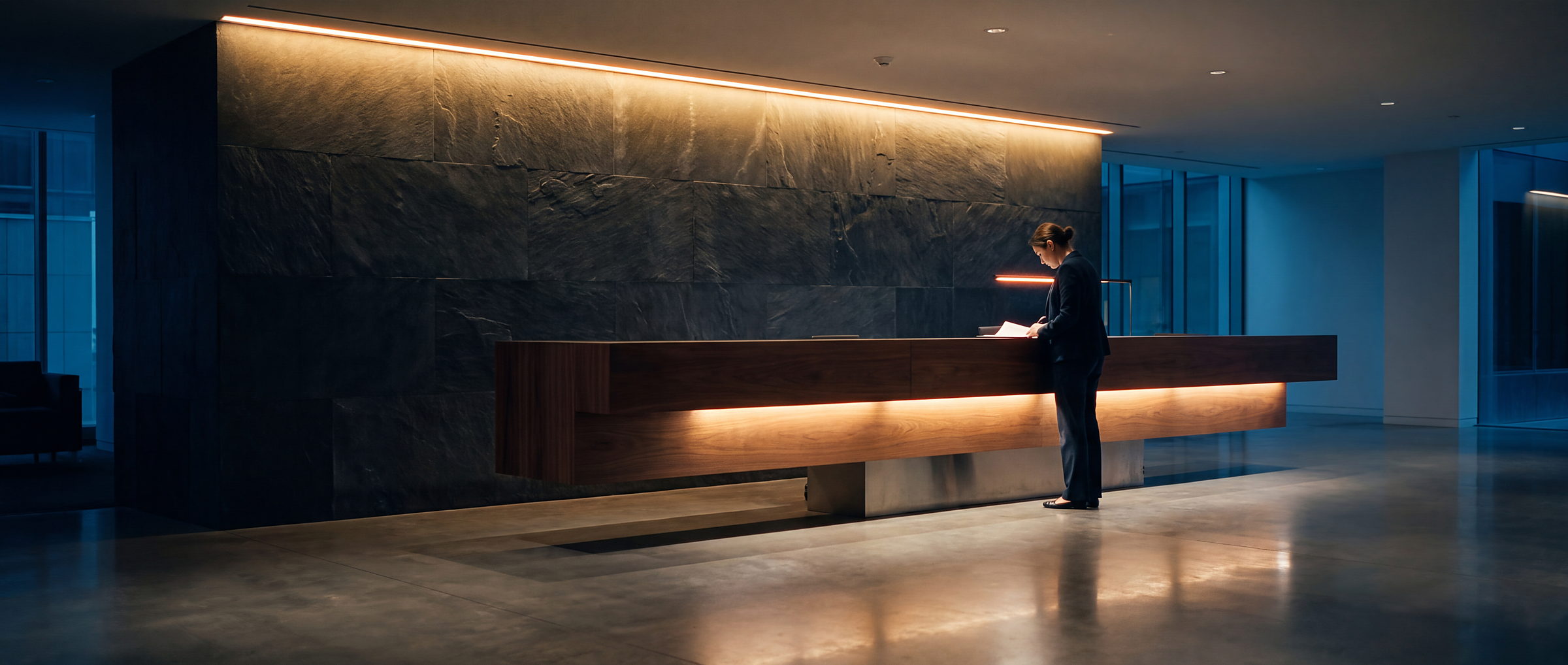 A commercial reception at dusk, front of house closing out the day under the evening lighting scene