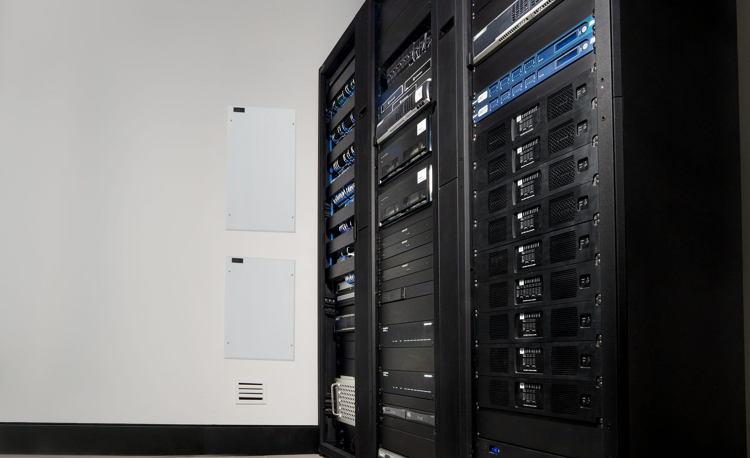 A CORVX rack room, racks aligned with clearance front and back