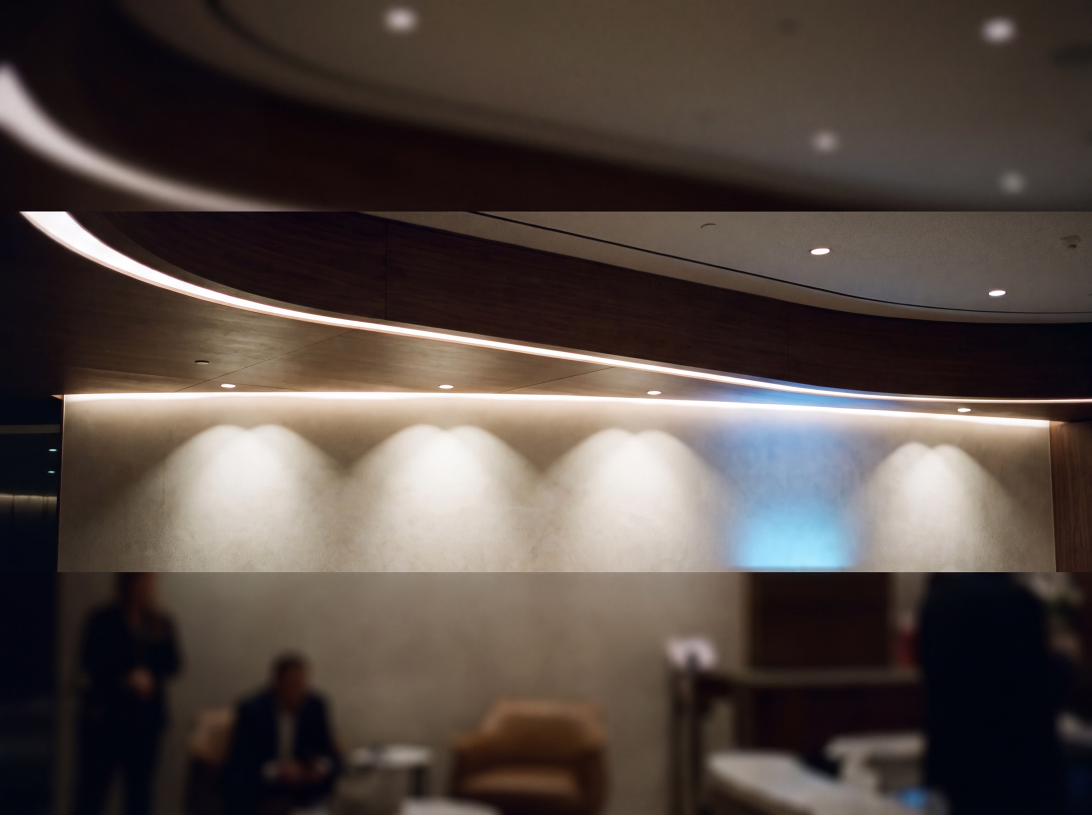 A delivered ceiling cove failing quietly: a hot stripe and scallop where the drawing showed one even line